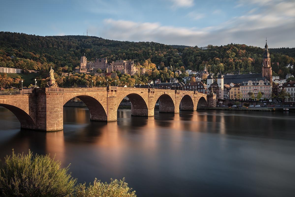 View of Heidelberg Palace with the old bridge in the foreground